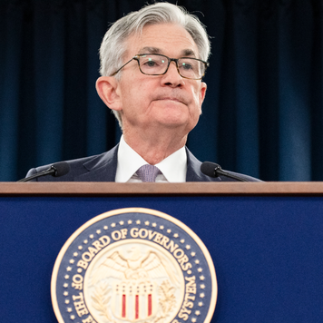 Federal Reserve Chair Jerome Powell speaks with journalists at a post-meeting press conference