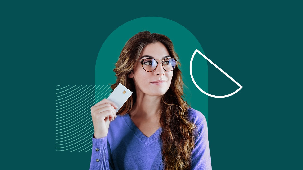 Woman holding credit card