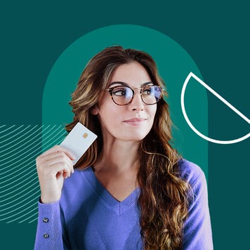 Woman holding credit card