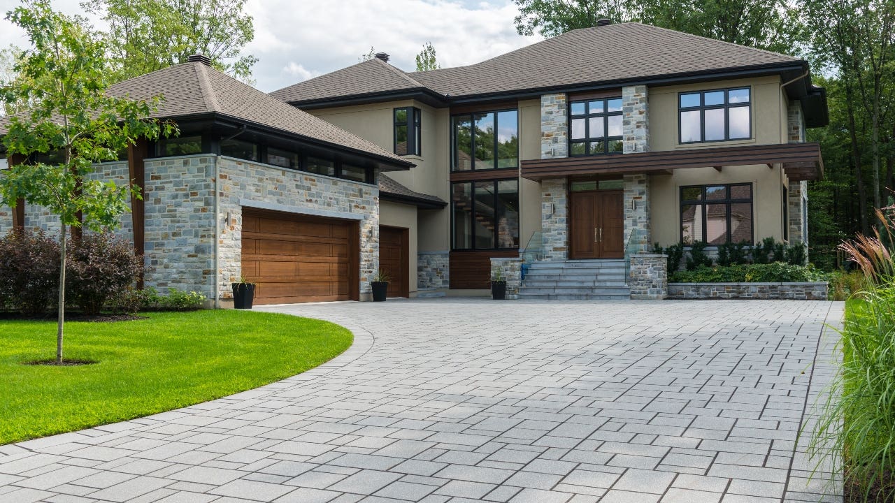 A single-family home with attached garage and driveway