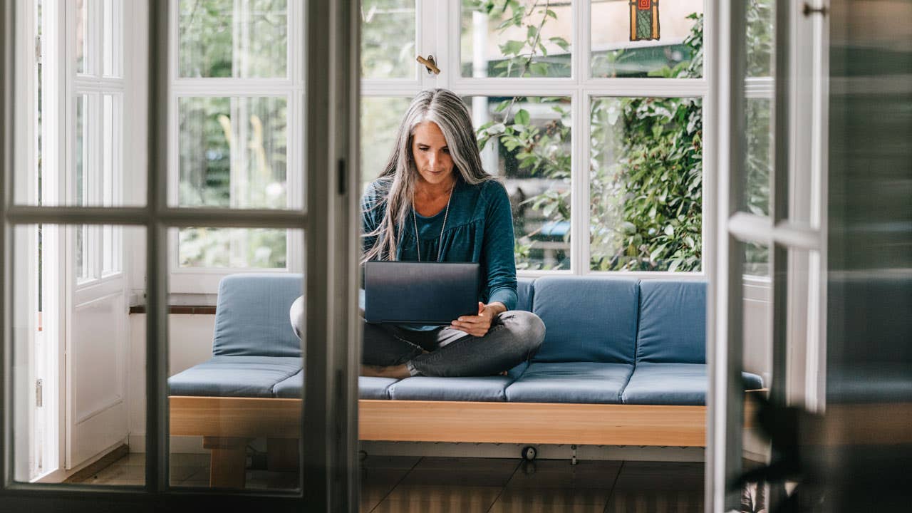 woman working on laptop at home