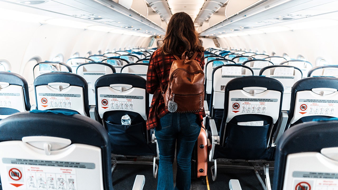 woman deboarding a commercial plane
