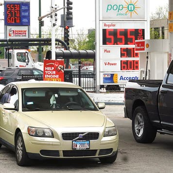 CHICAGO, ILLINOIS - MAY 10: Customers purchase gas at a gas station on May 10, 2022 in Chicago, Illinois