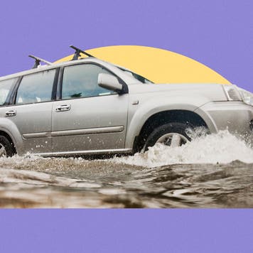 Car driving through flooded area