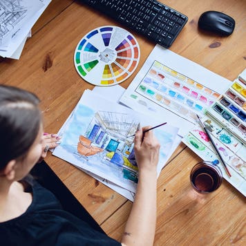 Woman painting watercolor
