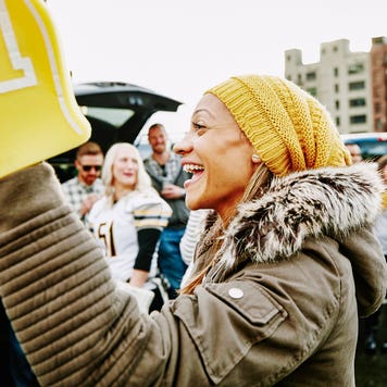 a fan with a foam finger
