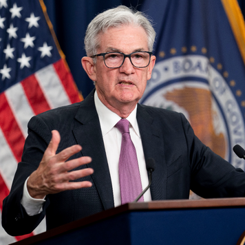 Federal Reserve Chair Jerome Powell speaks with journalists after the Fed's July meeting.