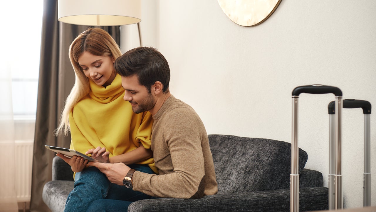 Family leisure. Couple enjoys staying together in a hotel