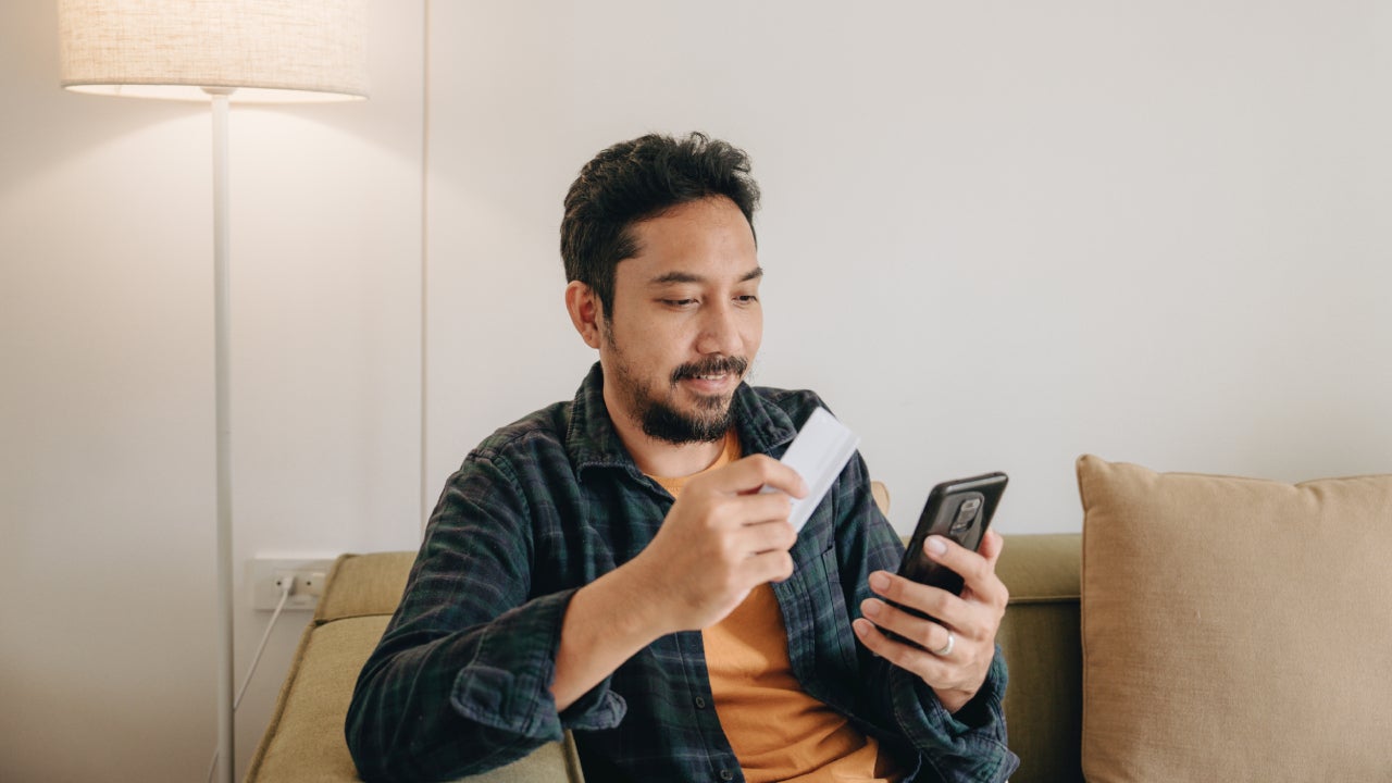 Young man shopping online