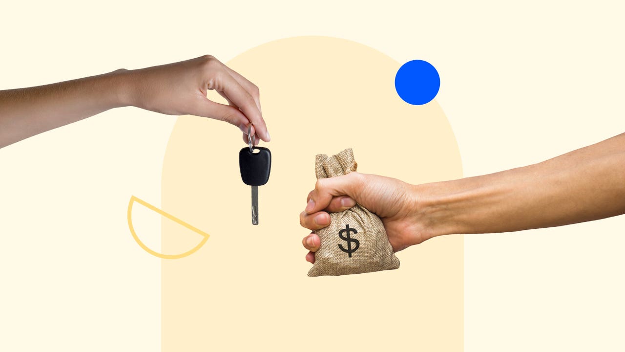 Hands trading a car key for money