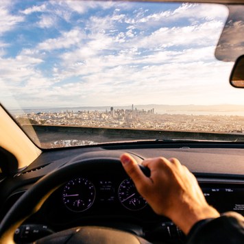 Driving car in San Francisco, personal perspective view, California, USA