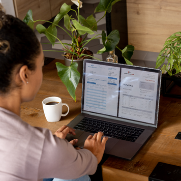 Woman sitting at desk on laptop