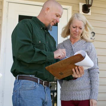 Contractor going over details of home inspection.