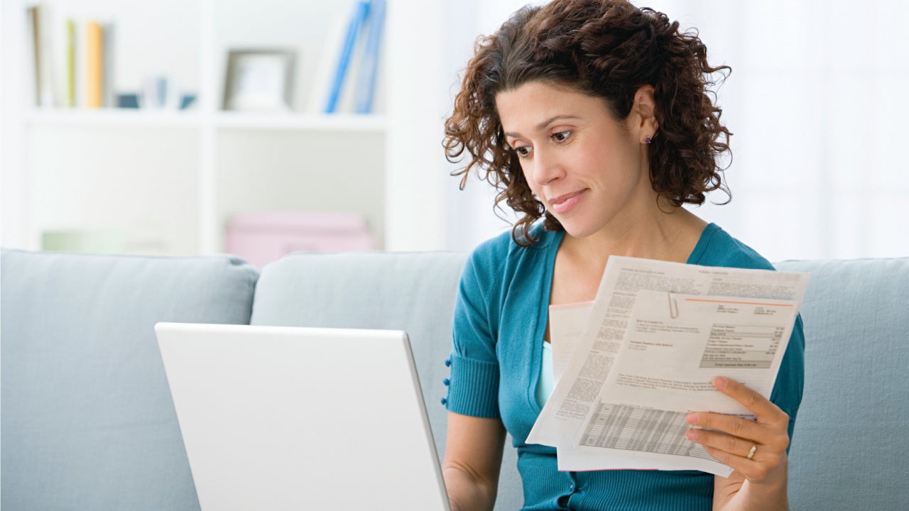 Woman paying bills online