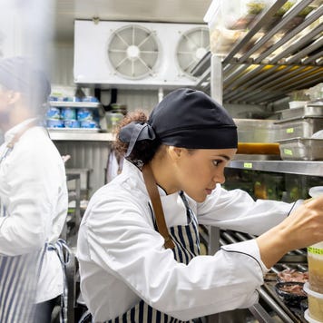 A chef works the line at her restaurant.