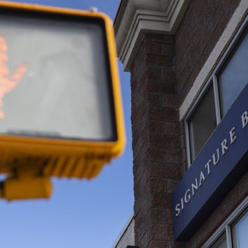 Signage outside a Signature Bank branch in the Brooklyn borough of New York