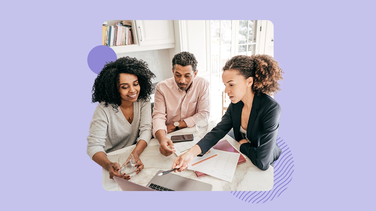 Three young professionals collaborating on a project