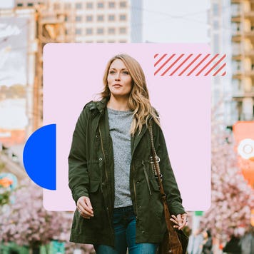 Confident woman walking downtown in a big city