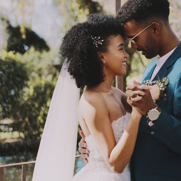 Cropped shot of a happy newlywed couple dancing together after their outdoor wedding
