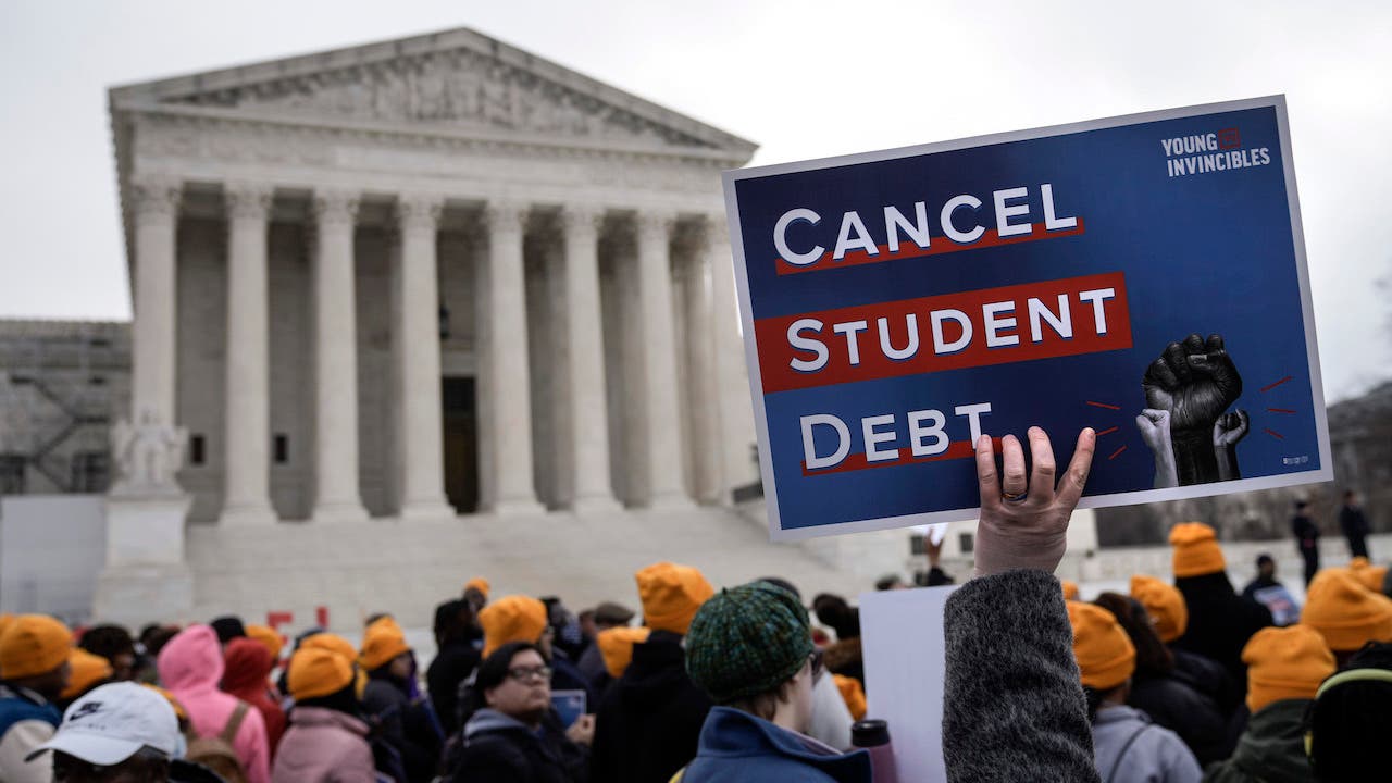 WASHINGTON, DC – FEBRUARY 28: People rally in support of the Biden administration’s student debt relief plan in front of the the U.S. Supreme Court on February 28, 2023 in Washington, DC. This morning, the U.S. Supreme Court will hear oral arguments in two cases challenging President Joe Bidens student loan debt forgiveness program, which remains on hold after a lower court blocked the plan in November. The two cases Biden v. Nebraska and Department of Education v. Brown, which could decide the fate of the program that aims to forgive an estimated $400 billion in student debt for 26 million borrowers. (Photo by Drew Angerer/Getty Images)