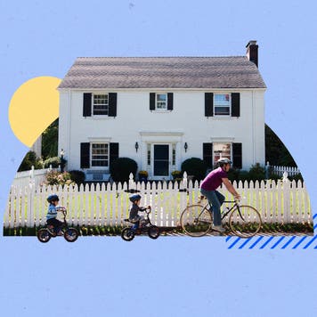 A dad and his two children riding bicycles together