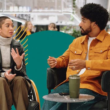 Young professional having a casual conversation at work