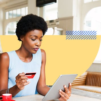 design element including women holding a credit card and on her tablet