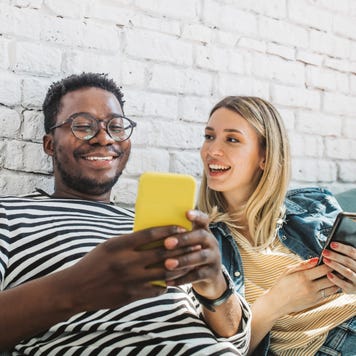 Friends at modern hostel room