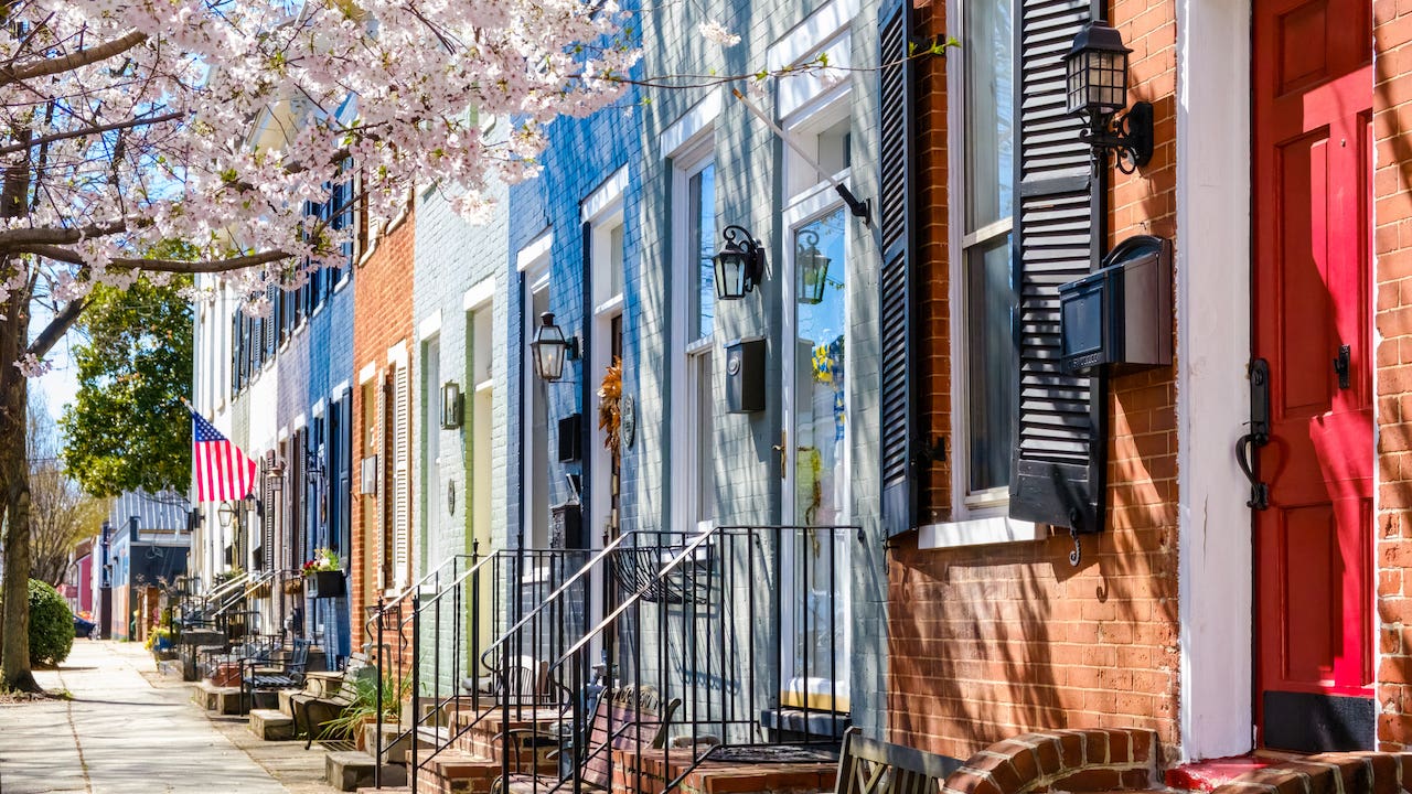 Row of Townhouses in Alexandria, Virginia , with cherry blossoms