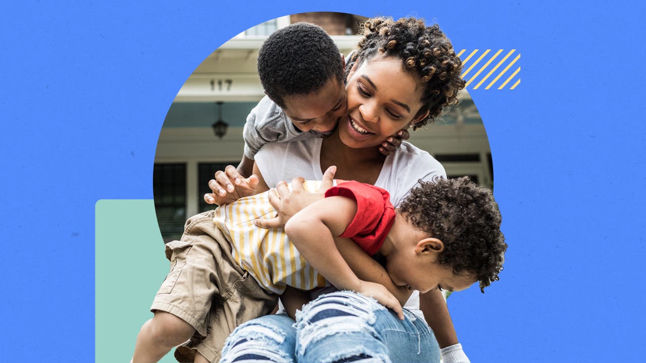 Mother holding two children