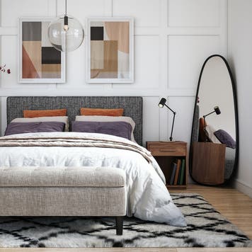 staged bedroom with modern furniture and bright window