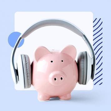 A piggy bank wearing headphones