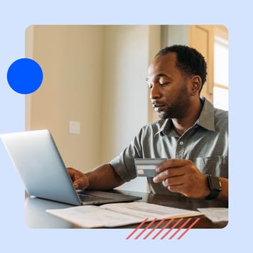 design image including a man on his laptop holding a credit card in one hand