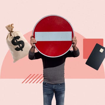 Man blocking face by holding a stop sign in front of himself