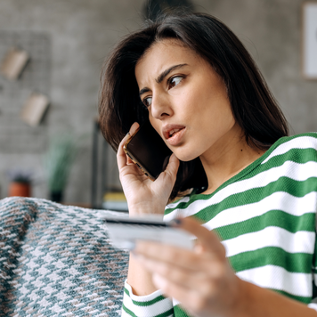 Upset nervous young woman become online scammers victim