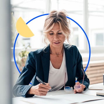 real estate agent going over paperwork at table