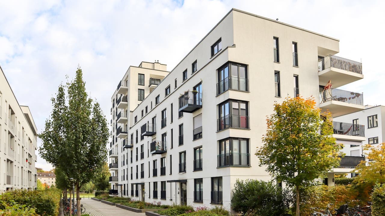 residential apartment building with green space outside