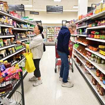 People shop in the food section of a retail store in Rosemead, California