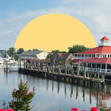 A row of beautiful houses along a body of water