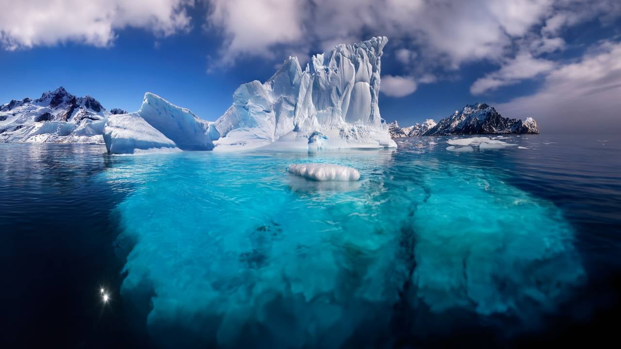 Icebergs floating in the sea off the coast of Antarctica