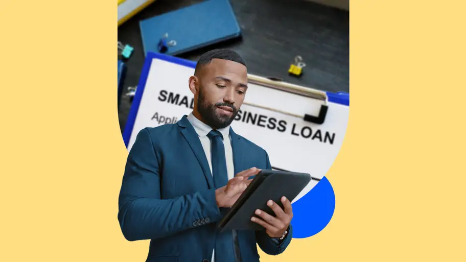 A small business owner applying for a loan on a tablet.