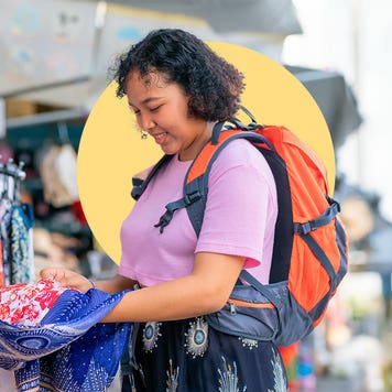 Woman looking at an article of clothing
