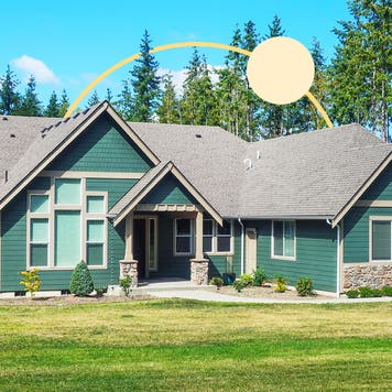A green house on a sunny day