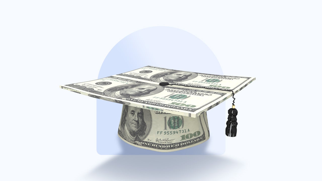 graduation cap wrapped in hundred dollar bills