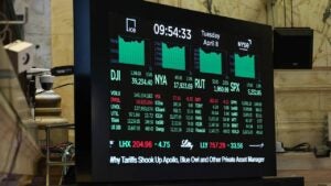 Stock market numbers are displayed at the New York Stock Exchange