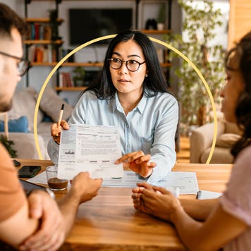 Image of a couple reviewing documentation