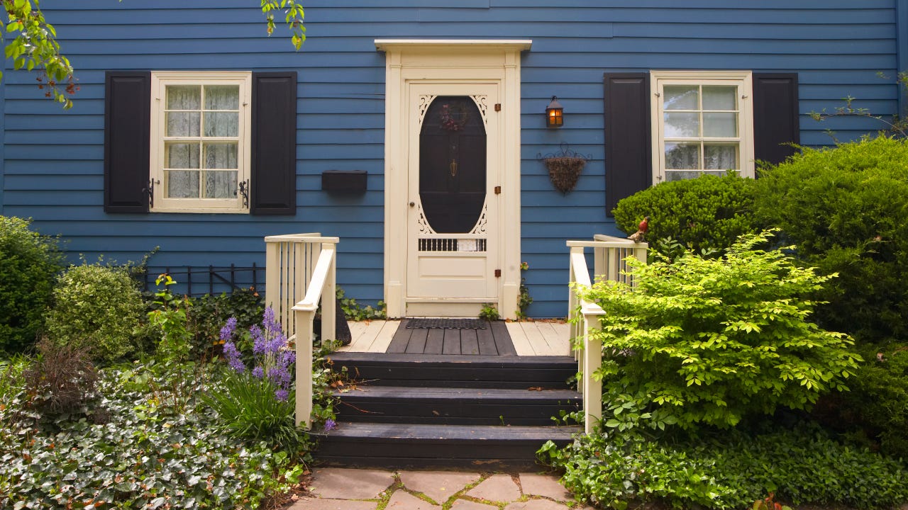 Traditional North American style residental houses on mature street with nice landscaping