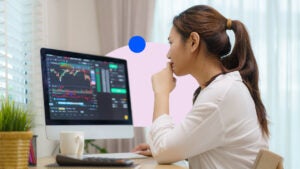 Woman reading a computer screen