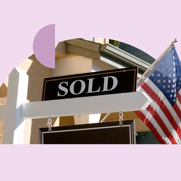 Image of a house with a "SOLD" sign