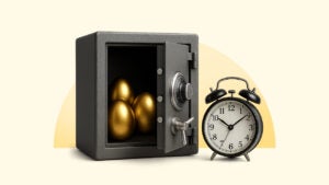 An open safe with golden eggs inside next to an alarm clock.
